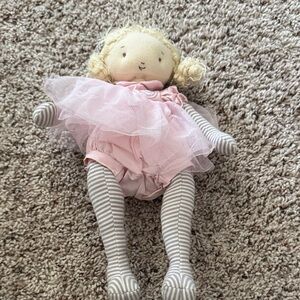 Adorable Pink Doll with Striped Legs